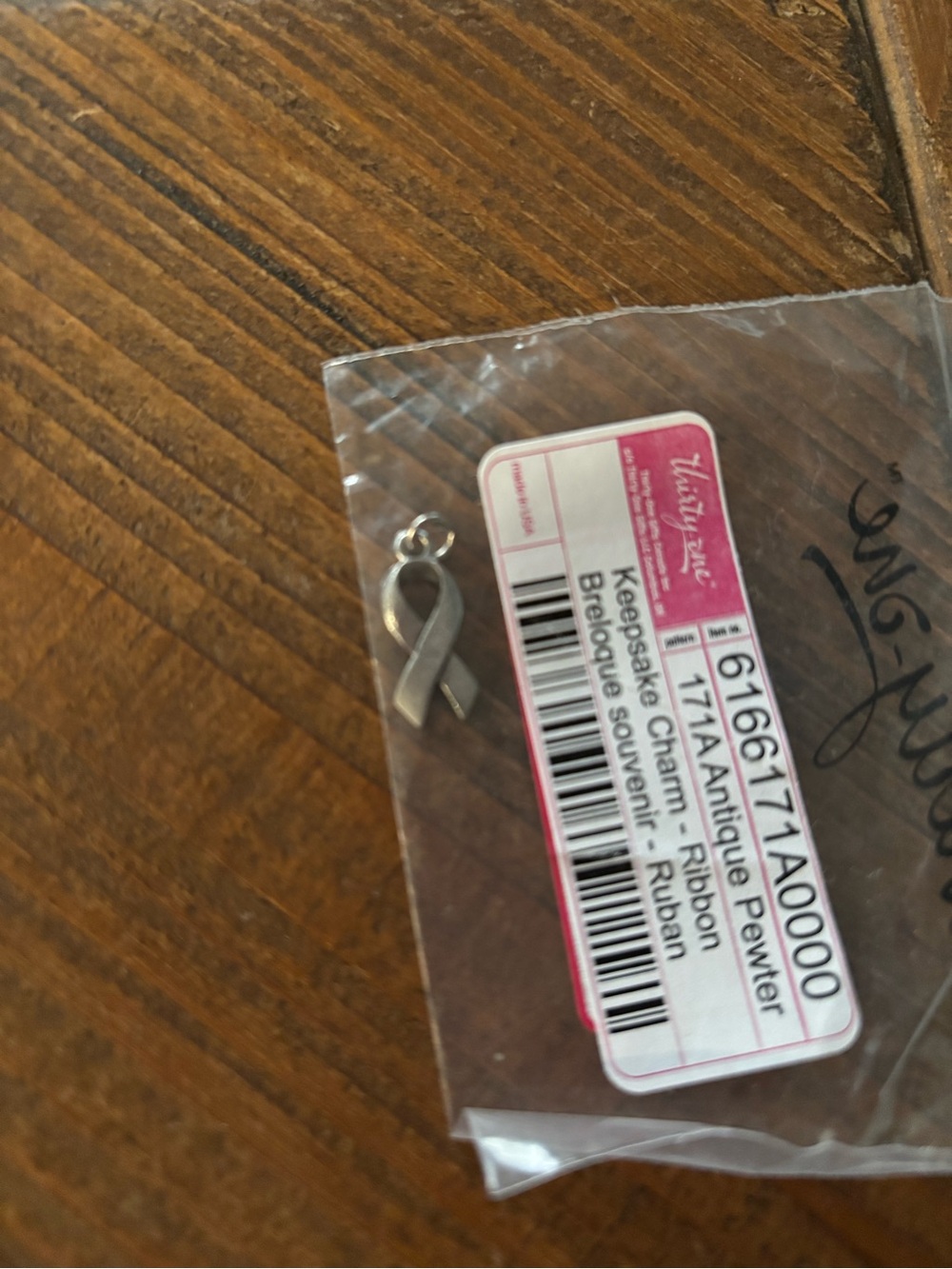 Charm in bag on table